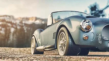 Photographe de voiture de luxe – vue extérieure